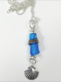 DevaArt Studio Artisan Handmade Jewelry Boutique. Ocean inspired, sterling silver sea shell necklace.