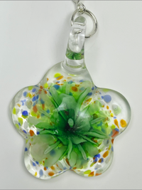 "Flower" is an artisan handmade necklace. Murano glass, sterling silver leaf, sterling silver 24" oval chain.