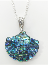 Ocean inspired sterling silver Pava scallop sea shell charm necklace.