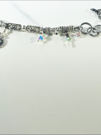 DevaArt Studio: eclectic handmade bracelet: sterling, antique silver, vintage beads, silver charms, Swarovski crystals.