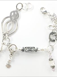 "Lola" - eclectic bracelet; sterling silver, amethyst crystals, hammered, antique silver, vintage beads, Swarovski crystals.