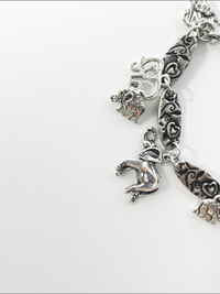 DevaArt Studio: eclectic bracelet; antique silver elephant charms, pewter, stainless steel, crystals.