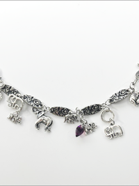 DevaArt Studio: eclectic bracelet; antique silver elephant charms, pewter, stainless steel, crystals.