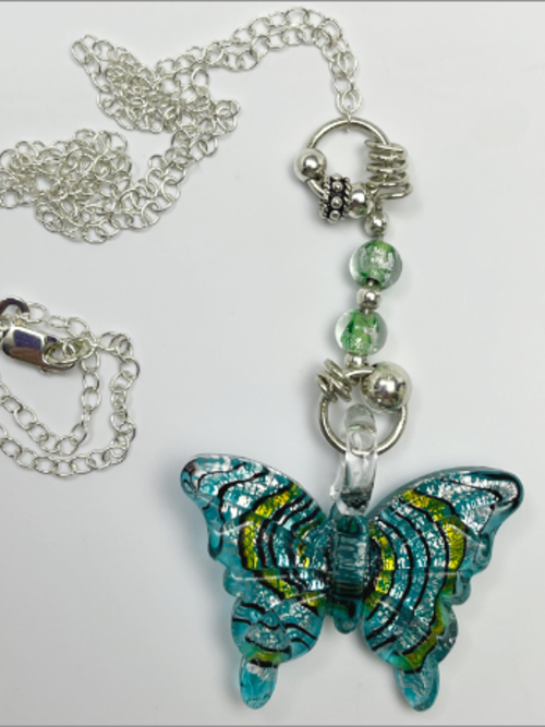 Butterfly is created by Dee Van Houten at DevaArt Studio: handmade dichroic fused glass necklace, sterling, glass beads.