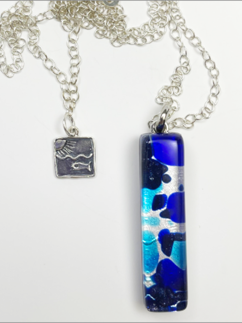 DevaArt Studio Artisan Handmade Jewelry Boutique. Murano glass, sterling sun, fish charms.