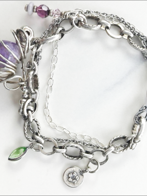 Eclectic handmade bracelet: vintage amethyst stone, Swarovski crystals, sterling silver beads.