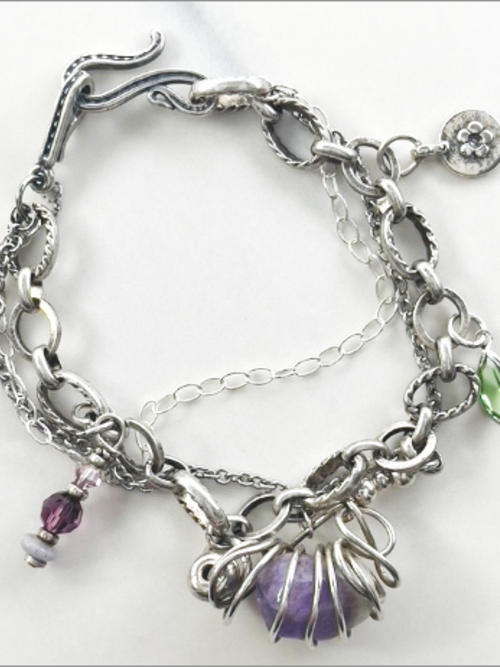 Eclectic handmade bracelet, vintage amethyst stone, Swarovski crystals, sterling silver beads.