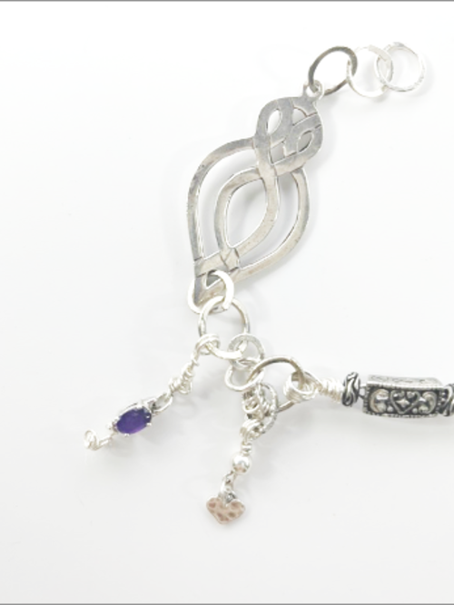 "Lola" - eclectic bracelet; sterling silver, amethyst crystals, hammered, antique silver, vintage beads, Swarovski crystals.