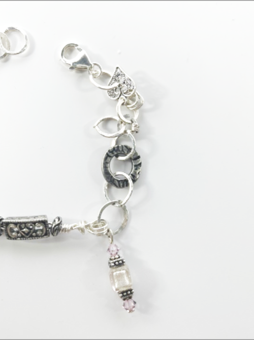 "Lola" - eclectic bracelet; sterling silver, amethyst crystals, hammered, antique silver, vintage beads, Swarovski crystals.