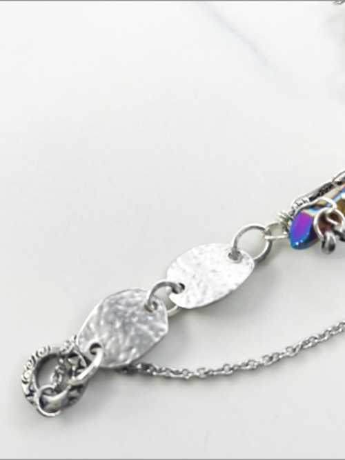 DevaArt Studio: rainbow quartz crystal, antique pewter chain, sterling silver components.