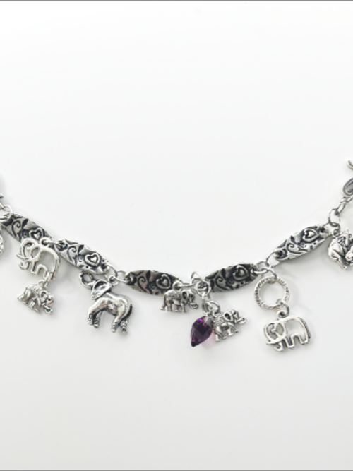 DevaArt Studio: eclectic bracelet; antique silver elephant charms, pewter, stainless steel, crystals.