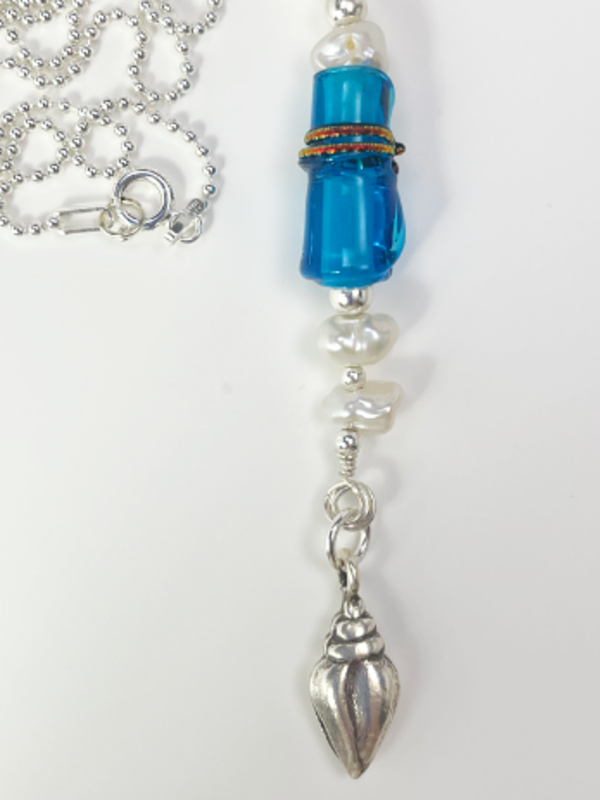 DevaArt Studio: Tide: Ocean Inspired handmade necklace, sea glass, blue glass bead, sterling silver beads.