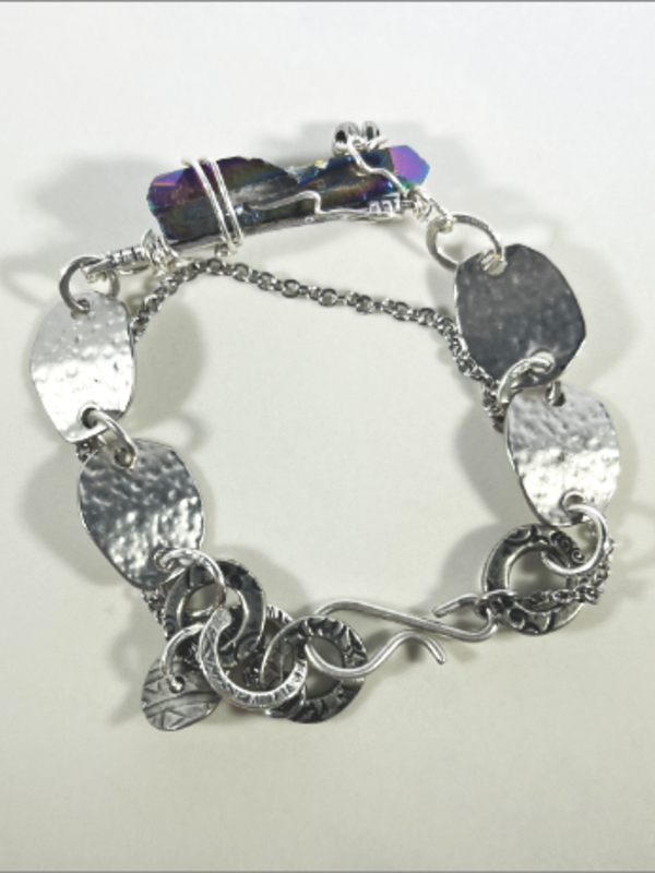DevaArt Studio: rainbow quartz crystal, antique pewter chain, sterling silver components.