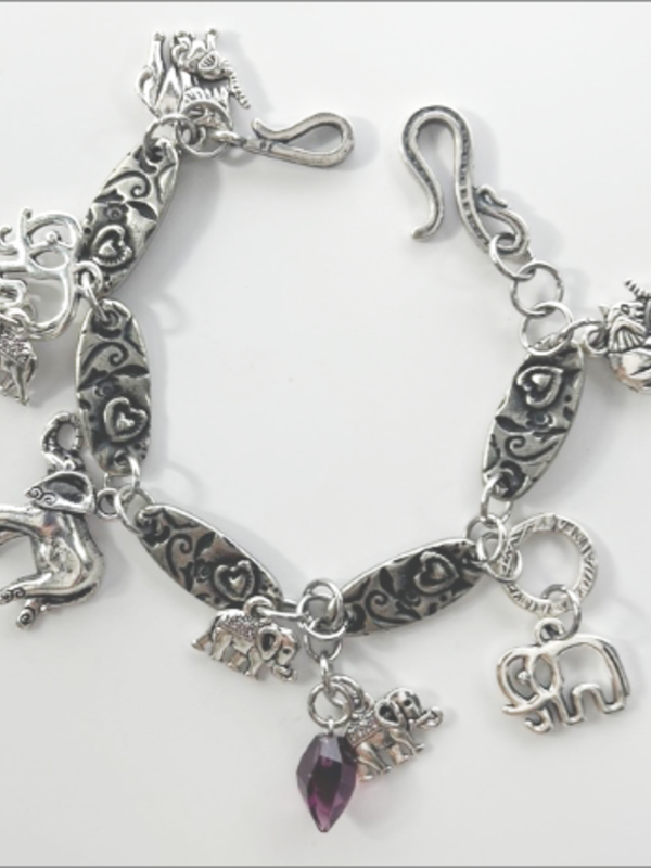 DevaArt Studio: eclectic bracelet; antique silver elephant charms, pewter, stainless steel, crystals.